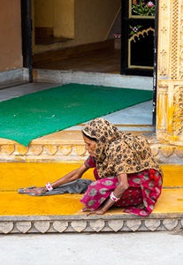 India-Jodhpur-Woman-Cleaning-Walkway